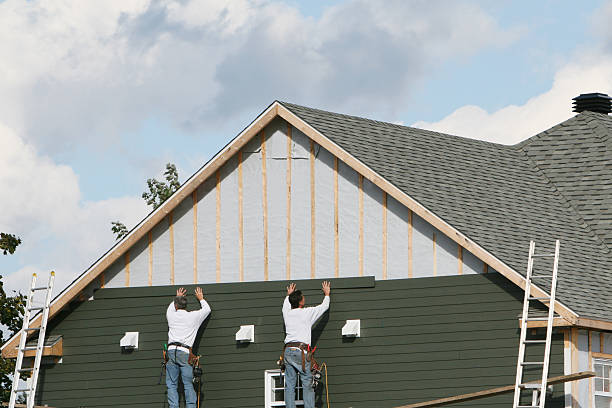 Professional Emergency Siding Repair technician working in Natrona Heights, PA